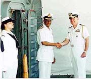 Deputy Chief of Indian Naval Staff Vice-Admiral S. V. Gopalchari being received by a US official on board USS Blue Ridge in Chennai on Wednesday. 