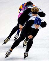 Norwegian speed skater Lasse Saetre leads a pack of skaters