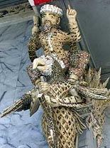A sculpture of Osama bin Laden riding on the back of an American eagle adorns the roof of a newly-built Buddhist temple