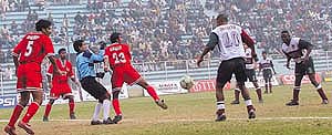 he players of JCT-Punjab in red and Mohan Bagan in white in action