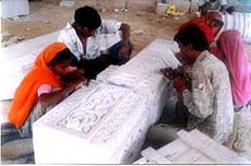 Artisans work on stones meant for the Ram temple at Abu Road in Rajasthan.