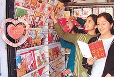 City girls buy cards on the eve of St Valentines Day, on Panjab University campus, Chandigarh, 