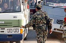 Nepalese soldiers direct traffic in Kathmandu