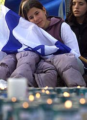Friends of Nehemia Amar mourn before his funeral