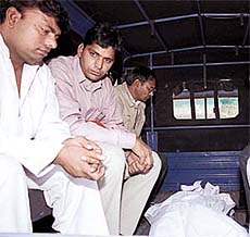 The body of Virender Singh, the PSO of former RSS chief Rajju Bhiaya, outside a mortuary in New Delhi on Monday.