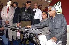Defence Minister George Fernandes during a visit to the Defexpo India 2002 defence exhibition