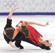 Figure skaters Naomi Lang and Peter Tchernyshev of the USA perform their free dance routine