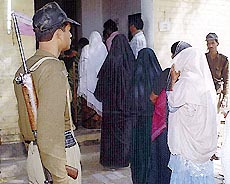 A paramilitary jawan keeps a vigil