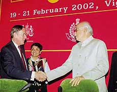 Union Home Minister L. K. Advani shakes hand with British High Commissioner to India Rob Young