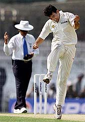 Zaheer Khan celebrates after claiming the wicket of opener Trevor Gripper 