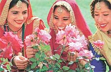 Blooming faces smile as hope-filled eyes admire roses during the Festival of Gardens in Sector 16, Chandigarh, on Friday.