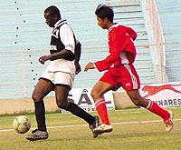 Indian Nationals and Moonlight in action during the DSA-SAIL Senior Division Football League Championship at the Ambedkar Stadium in the Capital on Friday.