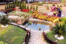 A family enjoying the 15th Garden Tourism Festival which opened at Talkatora Garden in the Capital on Friday.