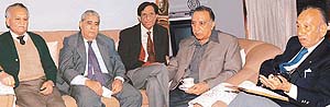 (From left) Air Marshal Randhir Singh, P.H. Vaishnav, D.V. Bhatia, Dr I.C. Pathak and M.M. Sharma discuss issues that threaten the basic character of the city in Chandigarh on Sunday.