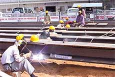 Finishing touches being given to the Metro tracks.