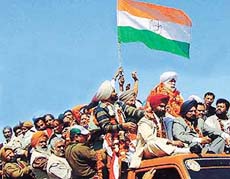 Congress candidate Bir Devinder Singh goes in a victory procession after winning the Kharar Assembly seat on Sunday.