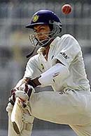 India's Sanjay Bangar sweeps a delivery 