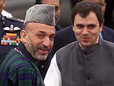Mr Hamid Karzai with Minister of State for External Affairs Omar Abdullah