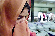 A woman weeps