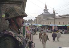 A BSF jawan stands guard