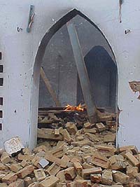 Fire burns inside the mosque in Kalayat, Kaithal which was attacked by a mob on Friday.