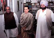 The Chief Minister of Punjab, Capt Amarinder Singh, and Mr Moti Lal Vora, in charge of Congress affairs in Punjab, with Mrs Sonia Gandhi