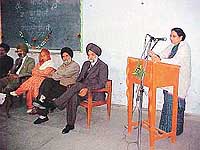 Dr Inderjeet Gill Vashisht, Principal, Government College for Women, addresses a seminar organised by the Punjabi Teachers Association in Ludhiana on Friday.