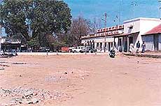 A view of the railway station and the wall that has been built across the railway road to facilitate taxi drivers and harass residents of the town.