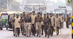 Delhi Police personnel marching through the Karol Bagh area, following the bandh call given by the VHP in the Capital on Friday.