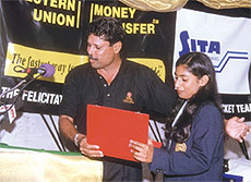 Indian womens cricket team captain Anjum Chopra, being honoured by former Indian captain Kapil Dev in the Capital.