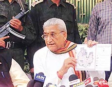 VHP working president Ashok Singhal addresses a press conference in New Delhi on Sunday