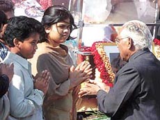 President K. R. Narayanan consoles the children