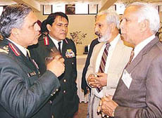 The Chief of Staff, Western Command, Lieut-Gen H.S. Kanwar, (left) interacts with delegates at a seminar held in Chandigarh on Tuesday.