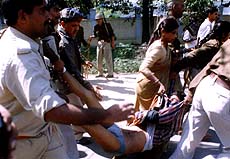 The assailant of Samajwadi MLA Mansoor Ahmed being carried away