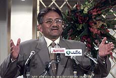 Pakistan President General Pervez Musharraf gestures during the opening speech