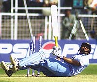 V.V.S. Laxman stumbles during the first one-dayer against Zimbabwe at Faridabad on Thursday.