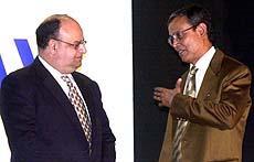 Shyamal Ghosh, chairman of the Telecom Committee and secretary DoT and Pradman Kaul, chairman and CEO of Hughes Network Systems 