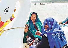 Women from Kakrali village, near Barwala, enjoy at the Sukhna Lake during celebrations of International Womens Day organised by the Community Medicine Department of the PGI. 