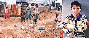 Youre invited: Open manholes in Karnail Singh Nagar are inviting disaster and (right) a victim, eight-year-old Vinayak Khosla. Photos Rajesh Bhambi
