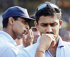 India's Anil Kumble and Tinu Yohanan 