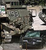 An Israeli bulldozer crushes a car