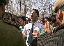 A student shouting slogans