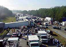 Rescue workers respond to a chain-reaction crash on Interstate 75 near Ringgold, Ga.