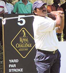 Comes the challenge, comes the man: Vijay Kumar, who leads the field on the third day, in action at the Royal Challenge Indian Open Golf in the Capital on Saturday.