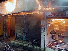 Shops burn in the Sindhi market