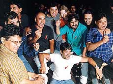 Actors from the successful Indian film Lagaan dance at a party in Mumbai