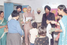 CBSE Chairman Ashok Ganguly with Delhi Sikh Education Council members and children at the workshop held at GHPS, Vasant Vihar.