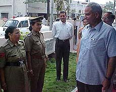 The Inspector General of Police, Modernisation and Welfare, Mr C.P. Bansal, talks to police personnel