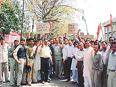 DYC activists take out a protest march demanding imposition of Presidents rule in J and K in Ludhiana on Monday.