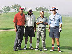 Former Indian cricketer Ajay Jadeja with the winners of Greater Noida golf tournament.